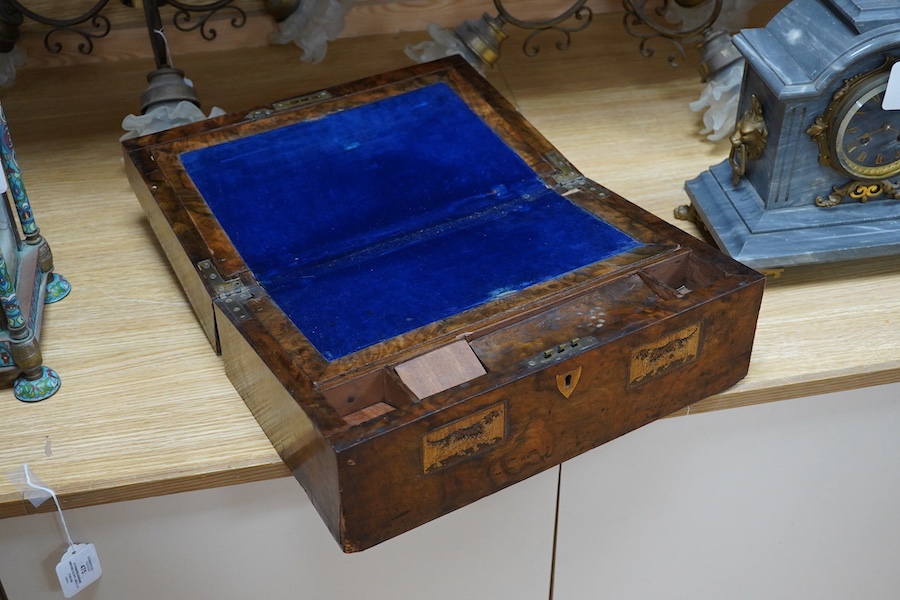A Victorian writing slope, painted with a panel of a ship in full sail. 39cm wide x 17 cm high. Condition - top cracked